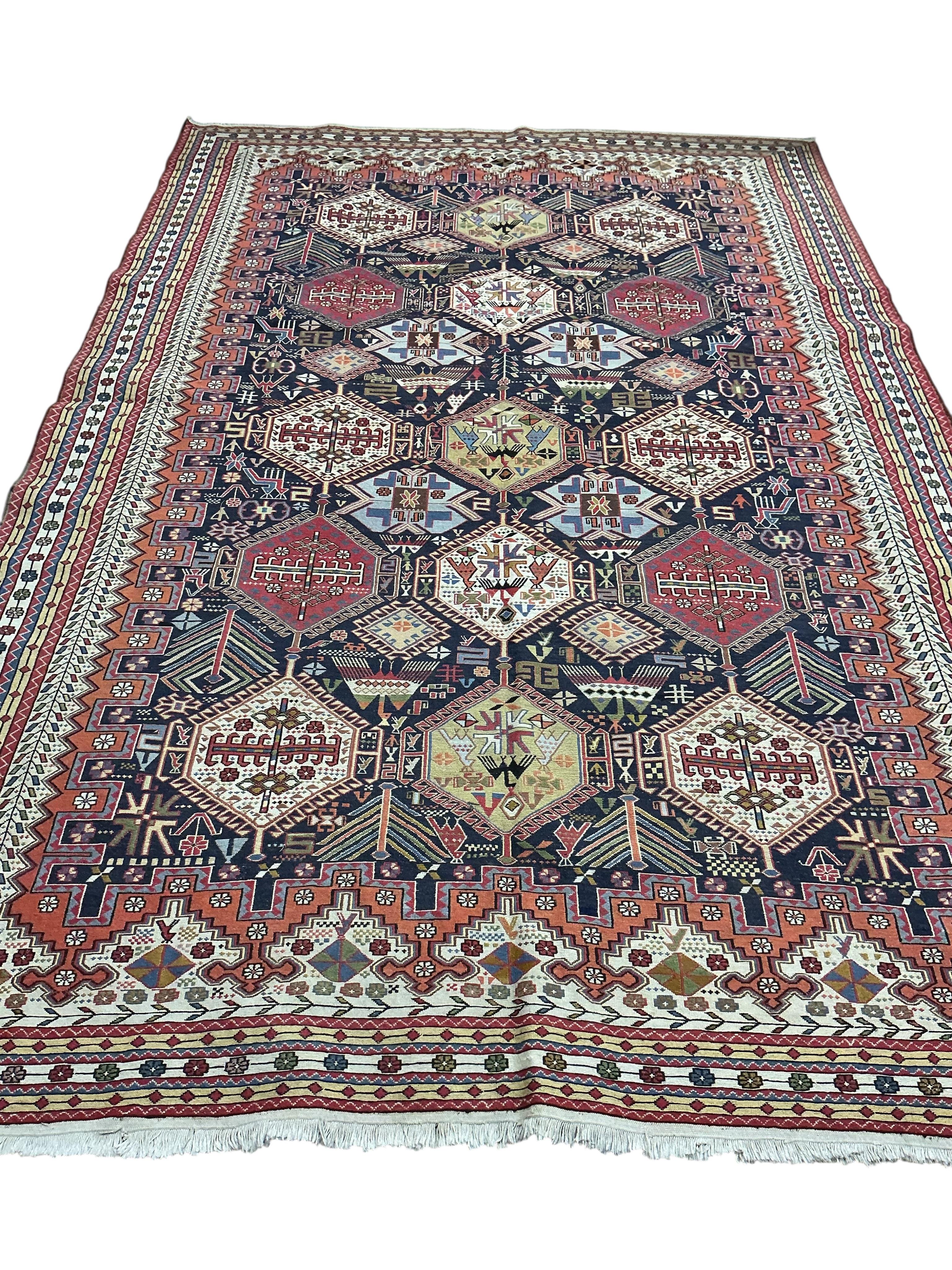 A Soumak blue ground carpet, 300 x 200cm